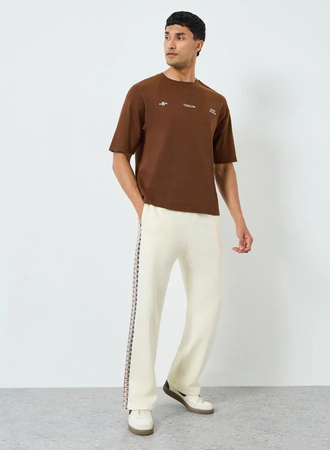 Men Cream Printed Side Panel Joggers